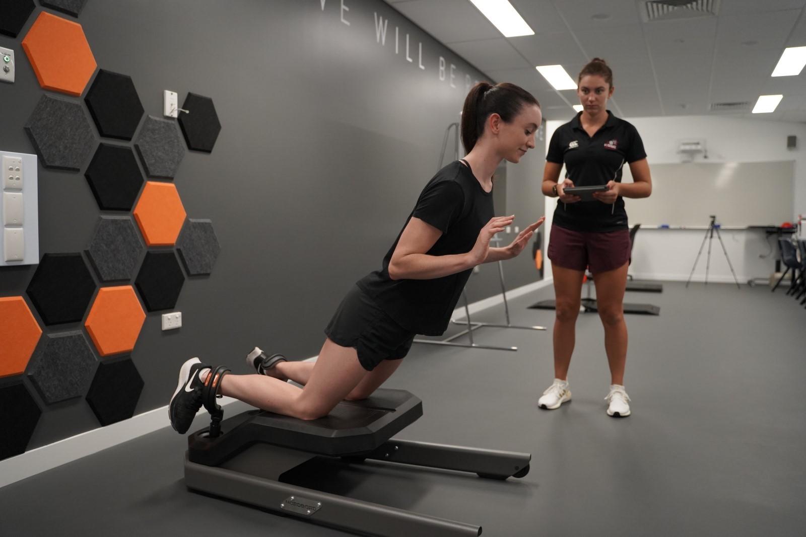 Athlete performing a Nordic hamstring strength test on a VALD NordBord.