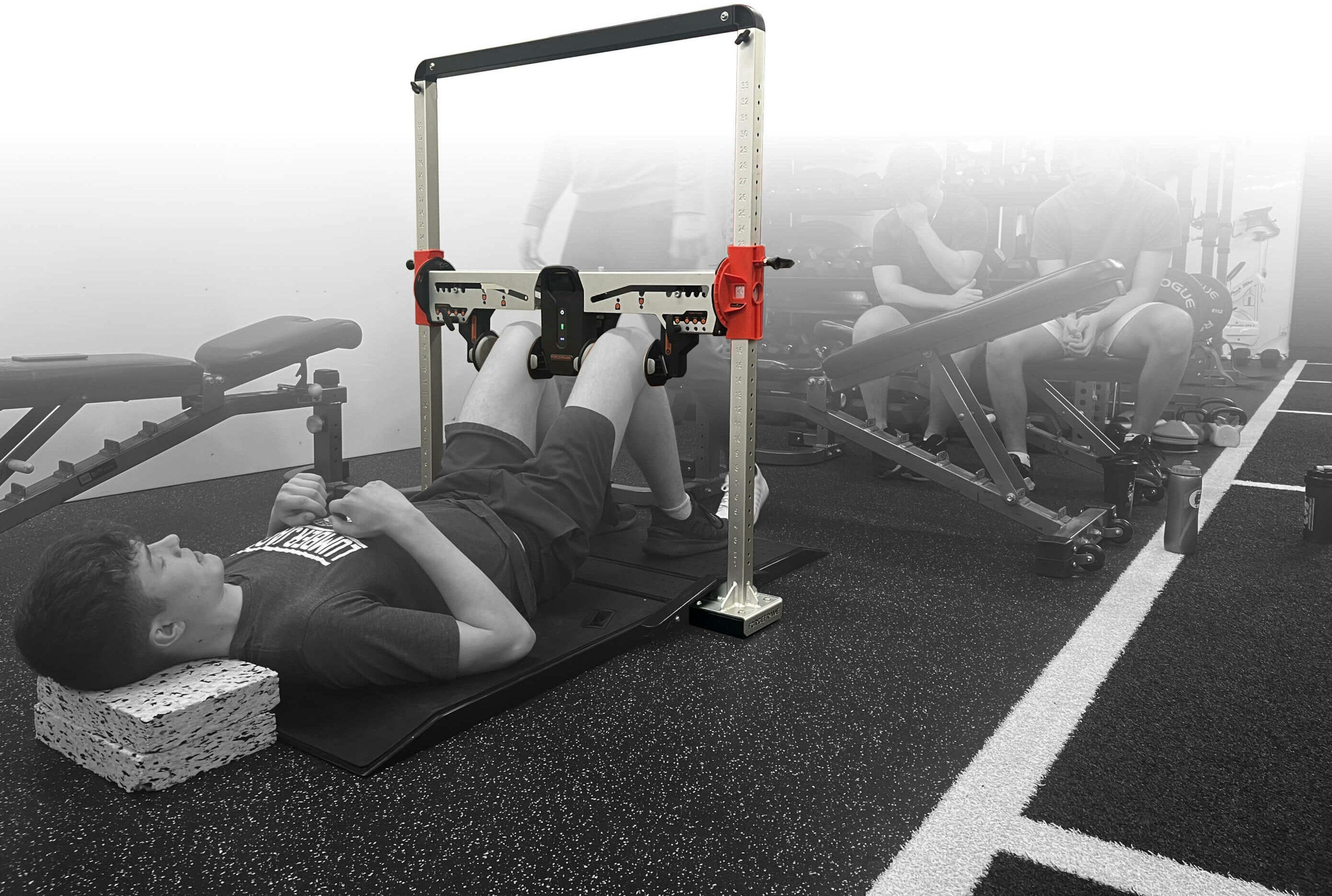 An Outside Edge athlete performing a hip adduction test with ForceFrame.